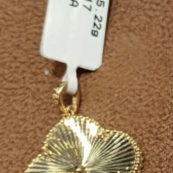 yellow gold 18 karat pendant.
5.22 grams of pure 18 k yellow gold. - Picture 8 of 11